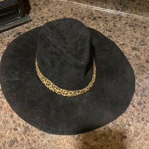 Cute black fashion hat with cheetah trim